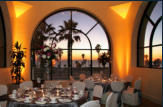 Pacific Meeting Room set for a banquet overlooking Catalina Island at sunset.